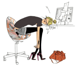 woman sleeping at desk